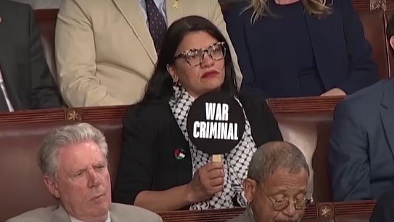 X : US Lawmaker Rashida Tlaib Holds Up ‘War Criminal’ Sign During Netanyahu’s Speech|